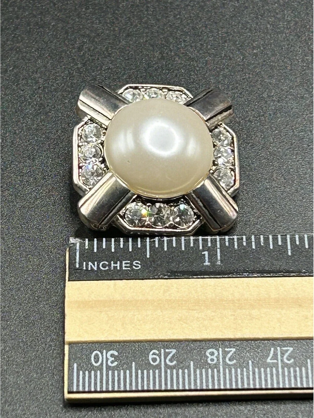 vintage 1950s fm silver tone pearl color center surrounded by rhinestones brooch